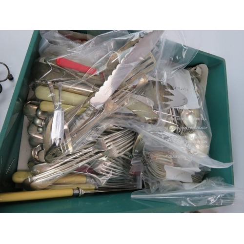 225 - A large selection of silver plated and steel cutlery and accessories including caddy spoons, sugar t... 