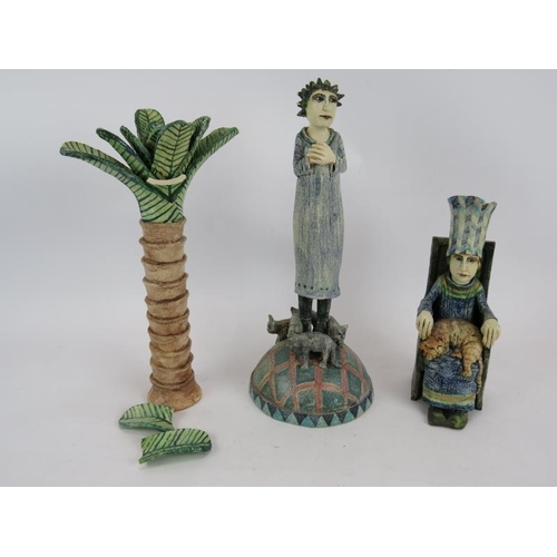 231 - Three pieces of Amanda Popham studio pottery including a pam tree and two figures with cats.  Talles... 