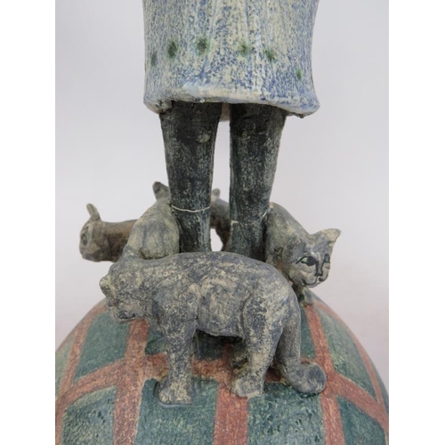 231 - Three pieces of Amanda Popham studio pottery including a pam tree and two figures with cats.  Talles... 