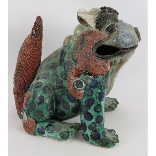 238 - A large studio pottery mythical beast, glazed in blues, greens and browns.  No makers mark.  Height:... 