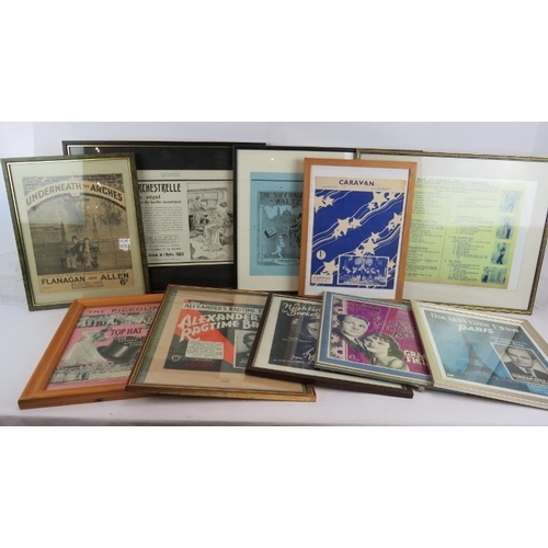 32 - A large collection of mainly framed 1930's and 1940's sheet music covers including Flanagan & Allan,... 