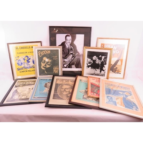 32 - A large collection of mainly framed 1930's and 1940's sheet music covers including Flanagan & Allan,... 