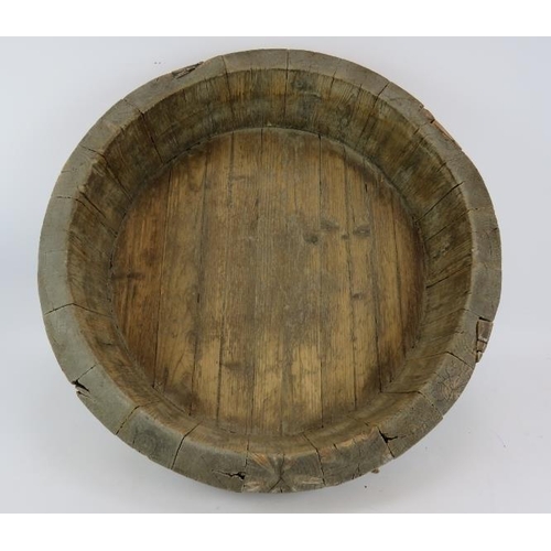 36 - A large coopered oak dairy bowl or dough trough with wire hoops.  Diameter: 68cm.
Condition report: ... 