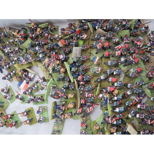 42 - A large collection of hand painted Napoleonic model soldiers including infantry and cavalry. Average... 