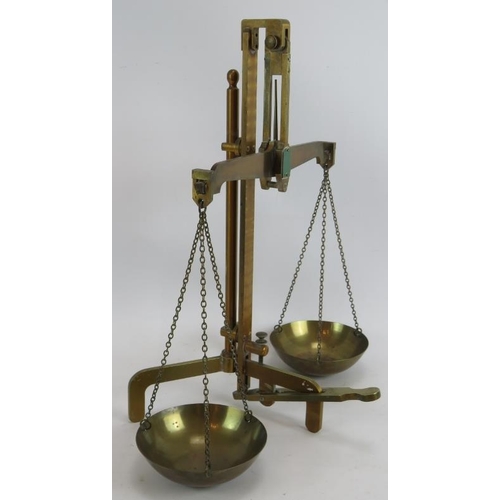 5 - A pair of 1950's brass balance scales by H.M. Stanley Ltd., London. To weigh up to 50 oz Troy. Heigh... 