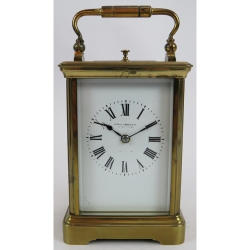 55 - An antique Mappin & Webb Ltd brass repeater carriage clock with leather travel case. Movement No 970... 