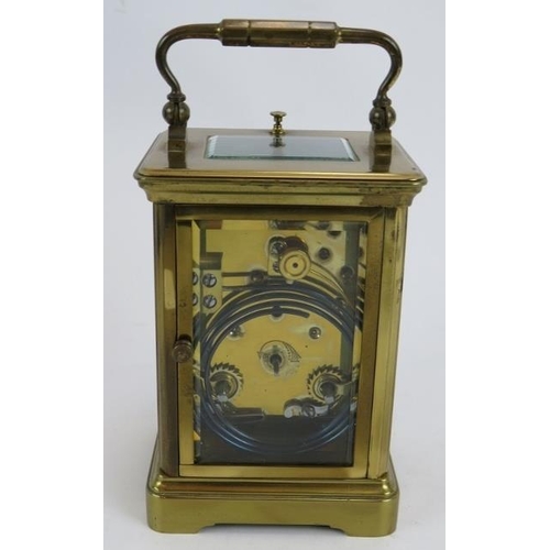 55 - An antique Mappin & Webb Ltd brass repeater carriage clock with leather travel case. Movement No 970... 