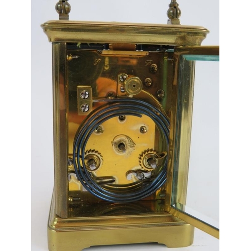 55 - An antique Mappin & Webb Ltd brass repeater carriage clock with leather travel case. Movement No 970... 