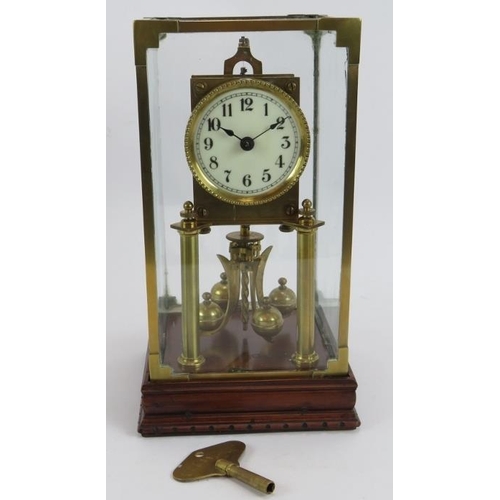 56 - An antique 400 day mantel clock under a bespoke brass glazed case. Movement No 57174. Key and pendul... 