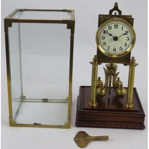 56 - An antique 400 day mantel clock under a bespoke brass glazed case. Movement No 57174. Key and pendul... 