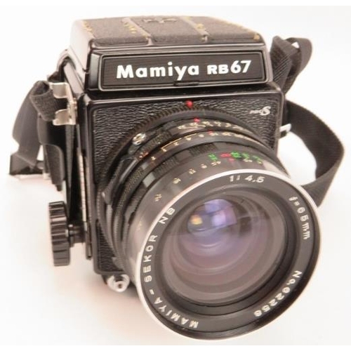 57 - A Mamiya RB67 Pro 5x7 format camera with a 65mm f4.5 Mamiya  Sekor lens. Wooden carrying case and fi... 