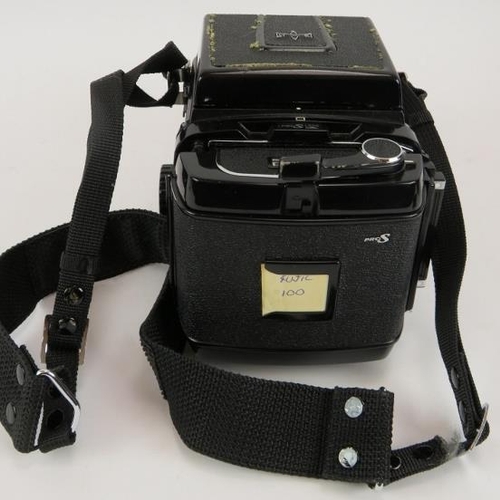 57 - A Mamiya RB67 Pro 5x7 format camera with a 65mm f4.5 Mamiya  Sekor lens. Wooden carrying case and fi... 