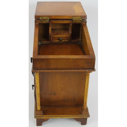 71 - A miniature Davenport desk, probably an apprentice piece, with leather top, internal fittings and th... 