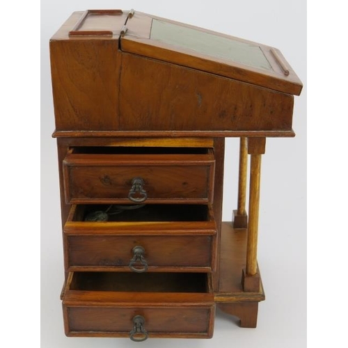 71 - A miniature Davenport desk, probably an apprentice piece, with leather top, internal fittings and th... 