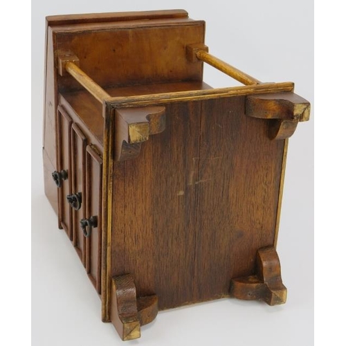 71 - A miniature Davenport desk, probably an apprentice piece, with leather top, internal fittings and th... 