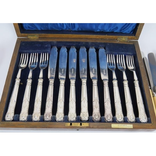 74 - A boxed set of Asprey & Co fish knives and forks, a pair of similar fish servers, a pair of salad se... 