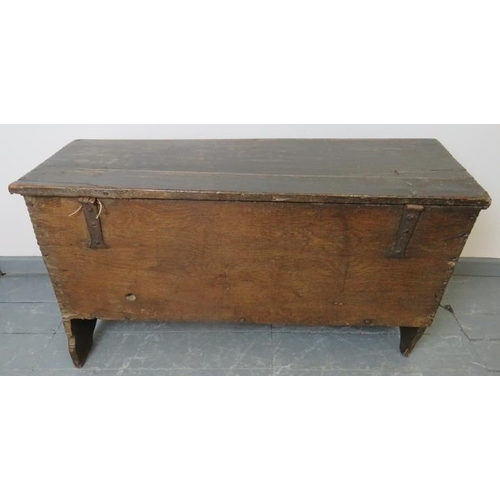 708 - A 17th century six plank oak coffer, on stile supports.
Condition report: Split to lid, various mark... 