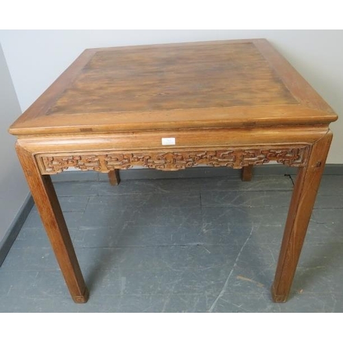 709 - A vintage Chinese elm ‘Eight Immortals’ table in the 19th century taste, with carved frieze, on squa... 