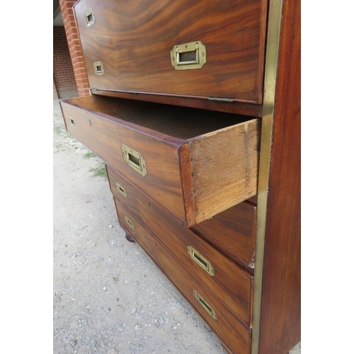 722 - A 19th century camphorwood campaign secretaire bookcase with brass mounts, the bookcase with two hei... 