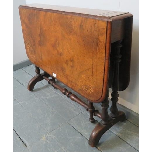 731 - A Victorian walnut Sutherland table, with marquetry inlay, on turned supports with ceramic castors. ... 