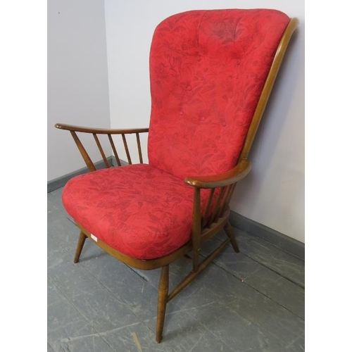 736 - A mid-century Ercol elm ‘Evergreen’ high back armchair in golden dawn finish, with loose cushions up... 