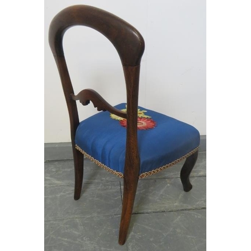 742 - A vintage mahogany balloon-back child’s chair in a Victorian taste, upholstered in a blue material e... 