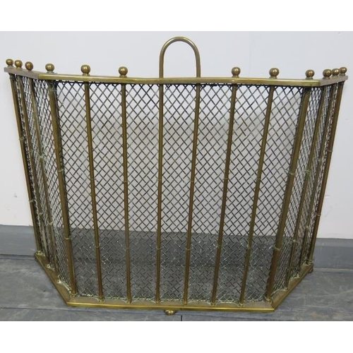 744 - An Edwardian three section folding brass and wire mesh fireguard with ball finials. 
Condition repor... 