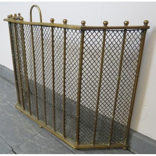 744 - An Edwardian three section folding brass and wire mesh fireguard with ball finials. 
Condition repor... 