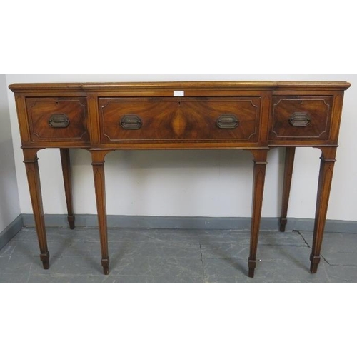 746 - An Edwardian Regency revival mahogany breakfront sideboard strung with ebony, housing three drawers ... 