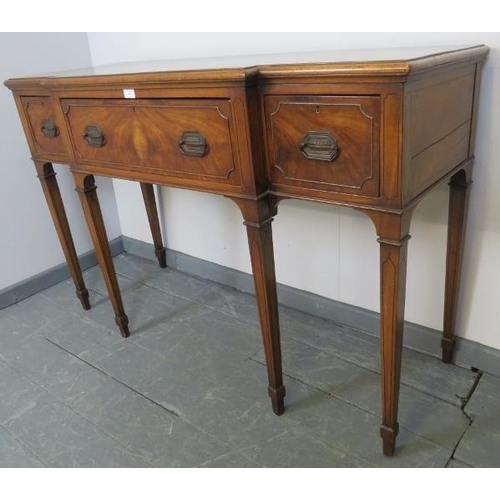 746 - An Edwardian Regency revival mahogany breakfront sideboard strung with ebony, housing three drawers ... 