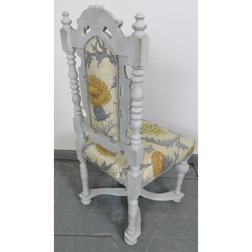 748 - An occasional hall chair, carved in the Carolean style with Flemish scrolls and acanthus leaves and ... 