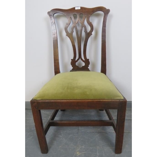 751 - A Georgian oak occasional chair with pierced backsplat and drop in seat pad upholstered in pale gree... 