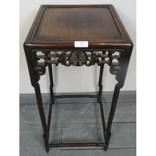 781 - An early 20th century Chinese rosewood occasional table/plant stand, with open fretwork frieze to fo... 