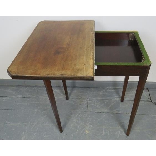790 - An Edwardian mahogany turnover card table, with inset green baize, on tapering square supports. 
Con... 