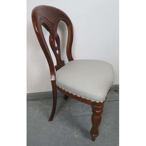 797 - A set of four Victorian mahogany balloon back dining chairs, reupholstered in light grey leather wit... 