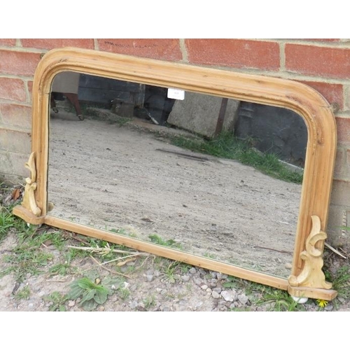 808 - A 19th century pine overmantle mirror, on ceramic bun feet.
Condition report: Mirror plate appears t... 