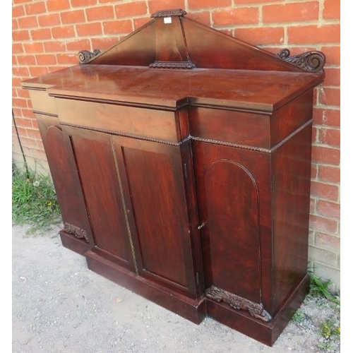 810 - A Victorian mahogany breakfront side cabinet, with gadrooned and acanthus carved gallery, housing a ... 