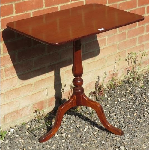 816 - A Victorian mahogany rectangular tilt-top wine table, on a baluster turned column and tripod base.
C... 