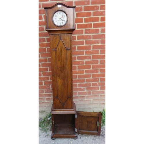 819 - A 1930s oak cased ‘grandmother’ clock with synchronous electric movement by Hamilton Sangamo, the ca... 