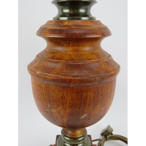 100 - A large turned wood table lamp of baluster form with patinated brass mounts. Height 54cm.
Condition ... 