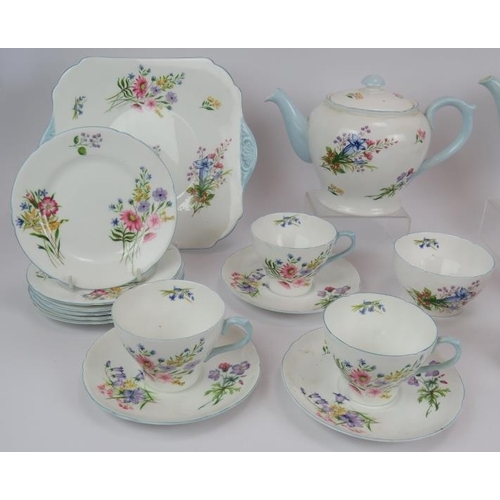 107 - A 24 piece six setting Shelley wildflowers tea service with plates, cups and saucers, tea and coffee... 