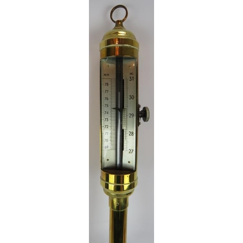 12 - A brass gimbal mounted stick barometer with silvered gauge. No maker's marks. Height 98cm.
Condition... 