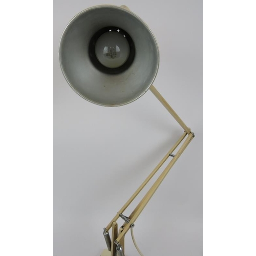 122 - An original Anglepoise lamp by George Cawardine for Herbert Terry & Sons. Cream with two step base a... 