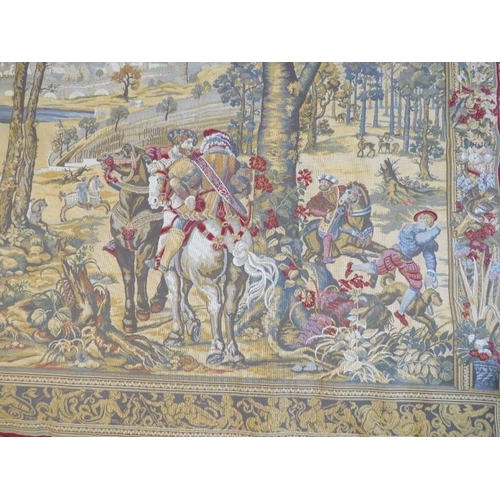 13 - A large contemporary machine woven Flemish tapestry depicting medieval scenes, mounted on a steel po... 