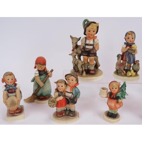 133 - 11 mixed German Goebel figurines 1930s onwards. Tallest 14cm. (11).
Condition report: One boy with c... 