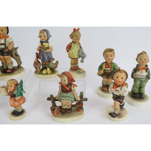 133 - 11 mixed German Goebel figurines 1930s onwards. Tallest 14cm. (11).
Condition report: One boy with c... 