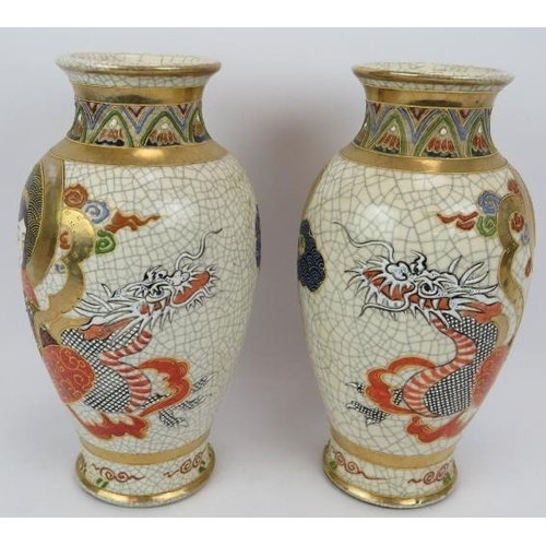 14 - A pair of decorative Japanese Satsuma style crackle glaze vases with dragon decoration. Both signed ... 