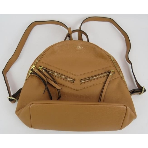 152 - A Radley tan zip top backpack handbag in grained hide. Original card and dust bag. All handbags purc... 