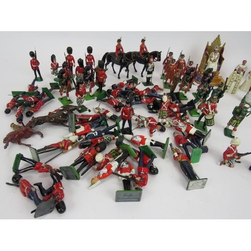 174 - A collection of mainly Britain's Die Cast model soldiers and a Blenheim Coronation set. (qty).
Condi... 