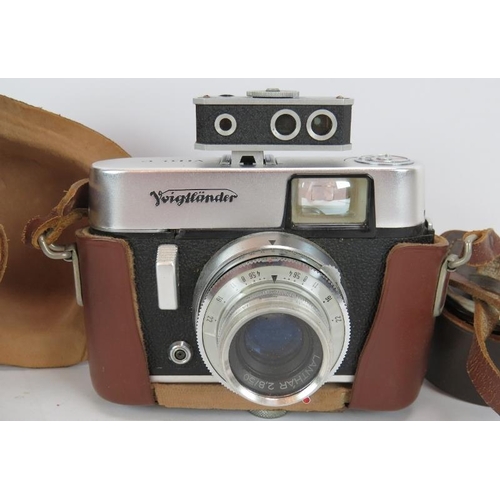 A Voigtlander Vito C vintage camera with leather case and
